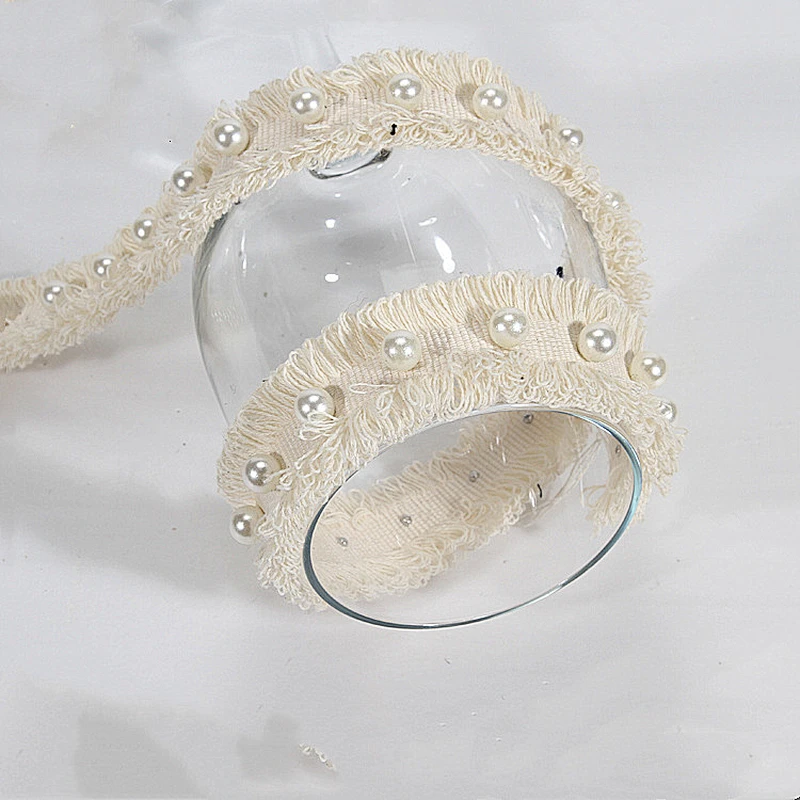 Good quantity beaded rivet on polyester lace tape for dress