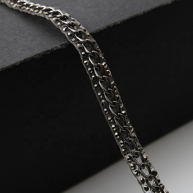 Accessories chain edging clothing trim with iron on melt adhesive backing applied to clothing