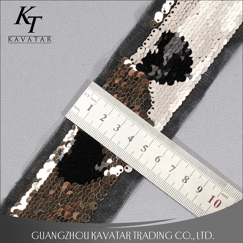 Double face different color sequin trim with motif