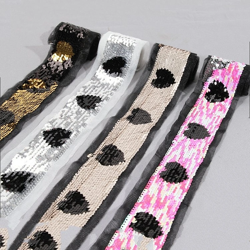 Double face different color sequin trim with motif