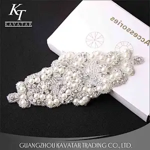 A lot of pearls and crystal sew on voile fabric for wedding dress accessories