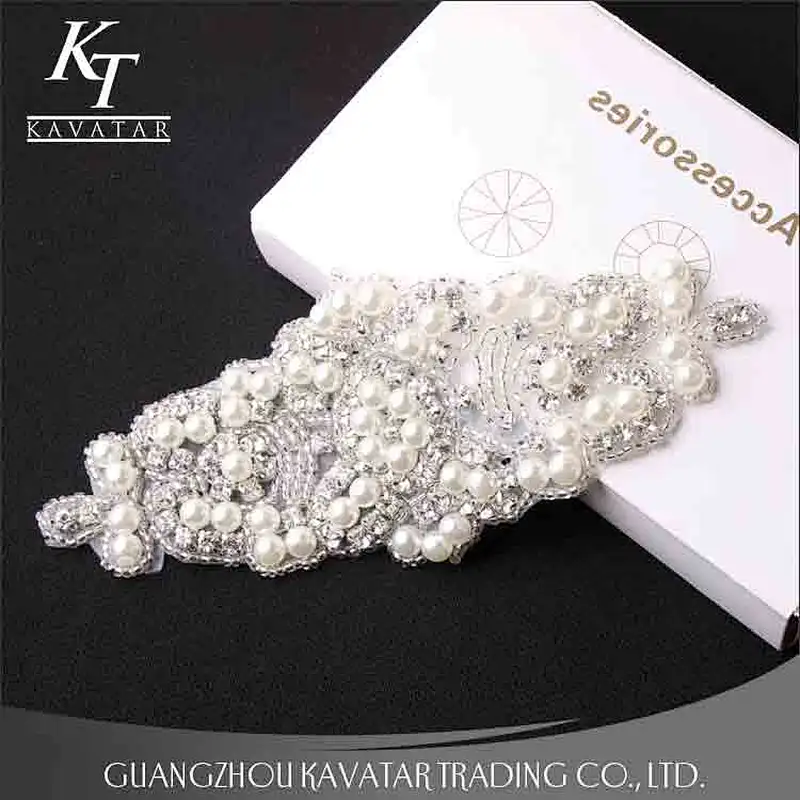 A lot of pearls and crystal sew on voile fabric for wedding dress accessories