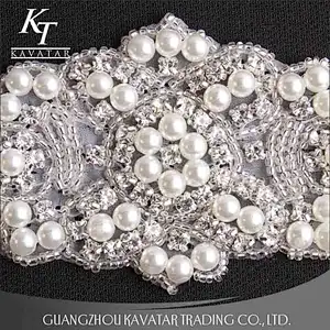A lot of pearls and crystal sew on voile fabric for wedding dress accessories