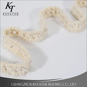 Good quantity beaded rivet on polyester lace tape for dress