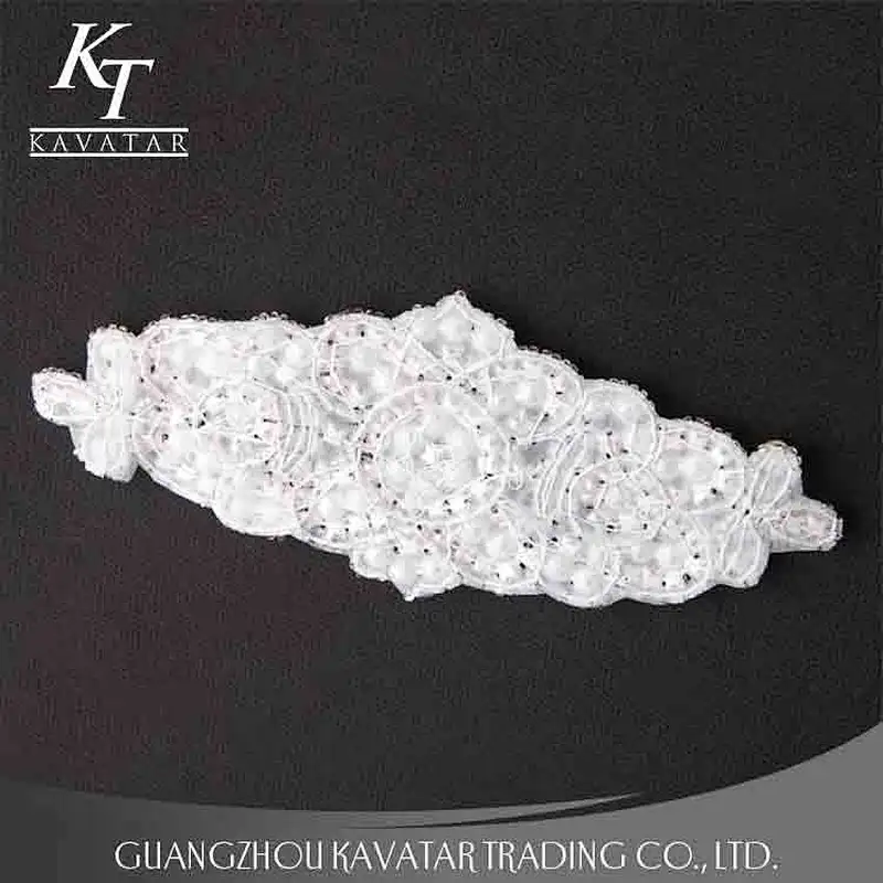 A lot of pearls and crystal sew on voile fabric for wedding dress accessories