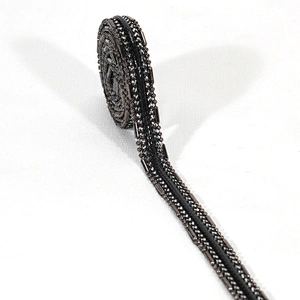 China Black Plastic Copper Beads Sequin Hot Fix Trim for Garments Bags Sandals