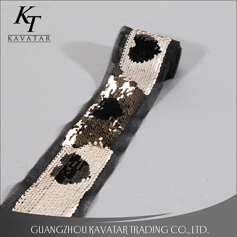 Double face different color sequin trim with motif