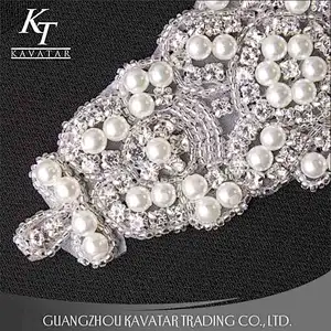 A lot of pearls and crystal sew on voile fabric for wedding dress accessories
