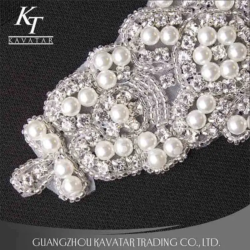 A lot of pearls and crystal sew on voile fabric for wedding dress accessories