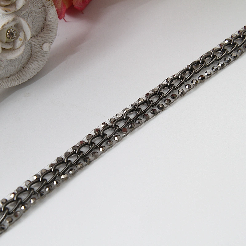 Accessories chain edging clothing trim with iron on melt adhesive backing applied to clothing
