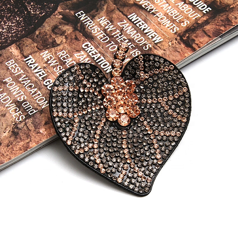 Patches to decorate clothing accessories shoes and hats are patches applique patches sewn with rhinestone beads