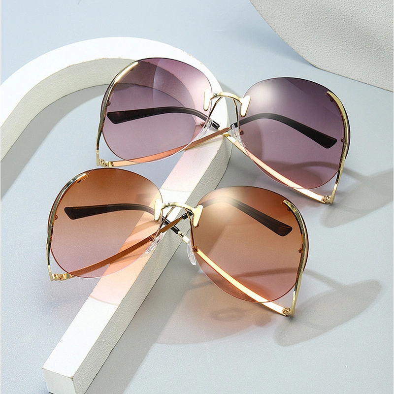 2021 Newest fashion personality rimless metal trendy sunglasses women men eyewear shade sun glasses wholesale custom goggles
