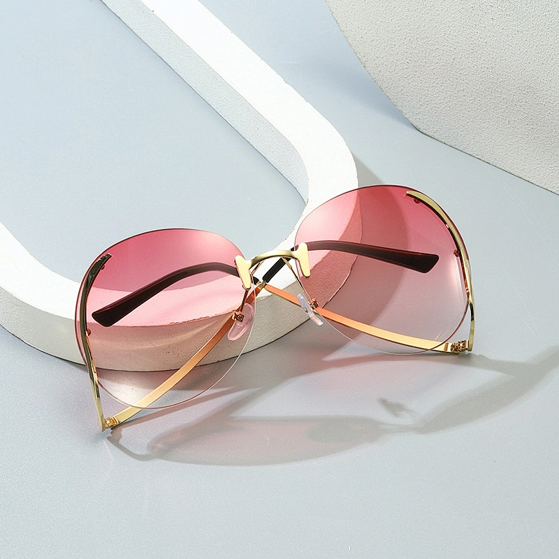 2021 Newest fashion personality rimless metal trendy sunglasses women men eyewear shade sun glasses wholesale custom goggles