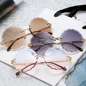 fashionable 2021 rimless retro sunglasses newest women men shades UV luxury sun glasses wholesale custom eyewear trendy goggle