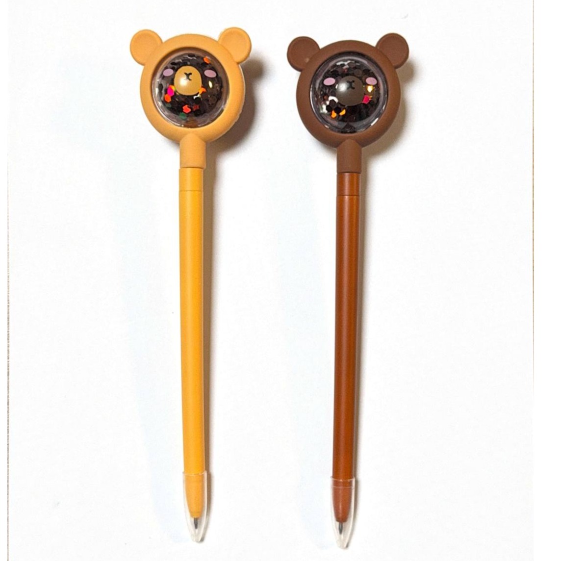 pen with a glittery bear topper
