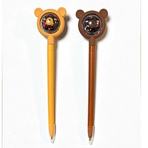 pen with a glittery bear topper