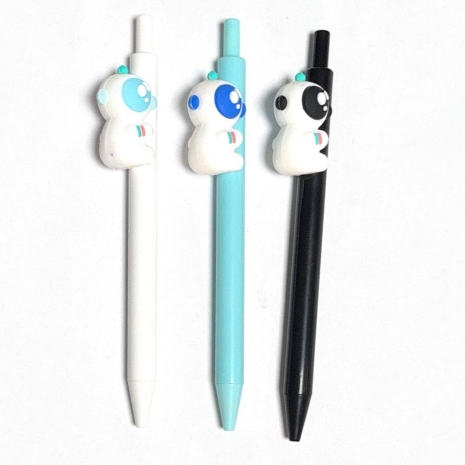 retractable pen with astronaut figurine on the side