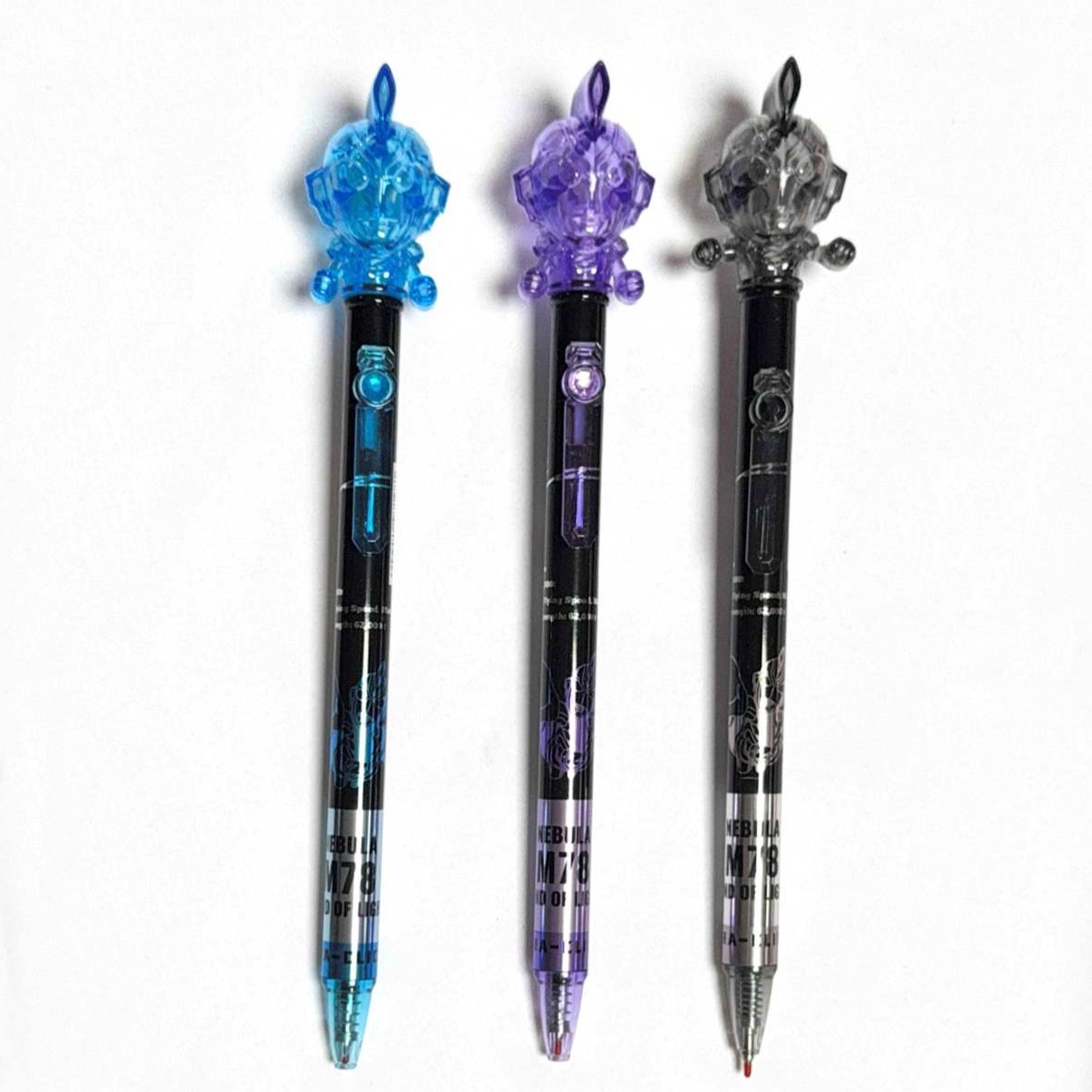 pen with a crystal Ulttraman on top