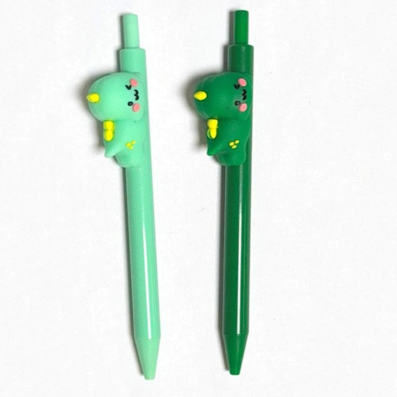 click pen with a dinosaur plush on the side