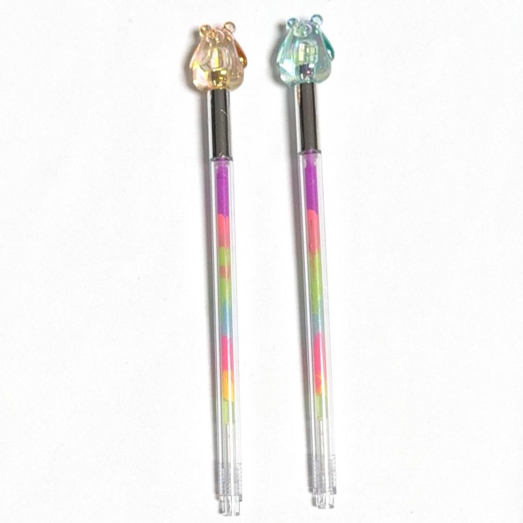 colored pen with crystal cow plush