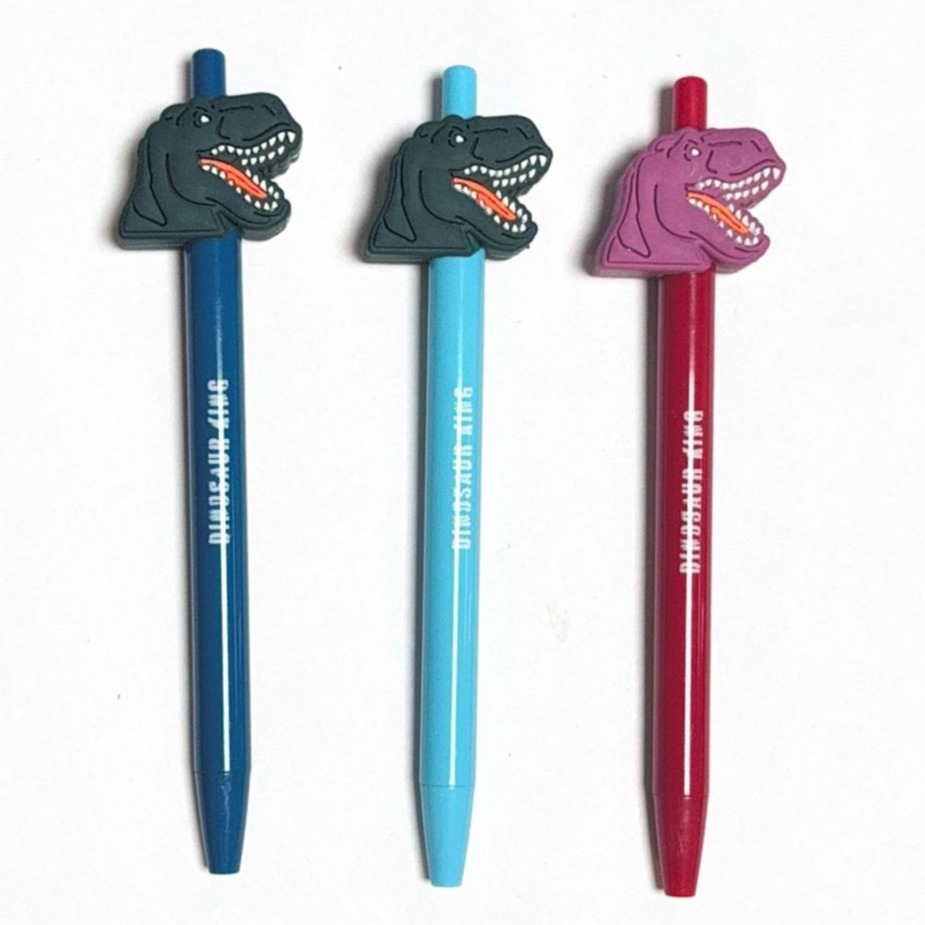 pen with dinosaur silicone topper