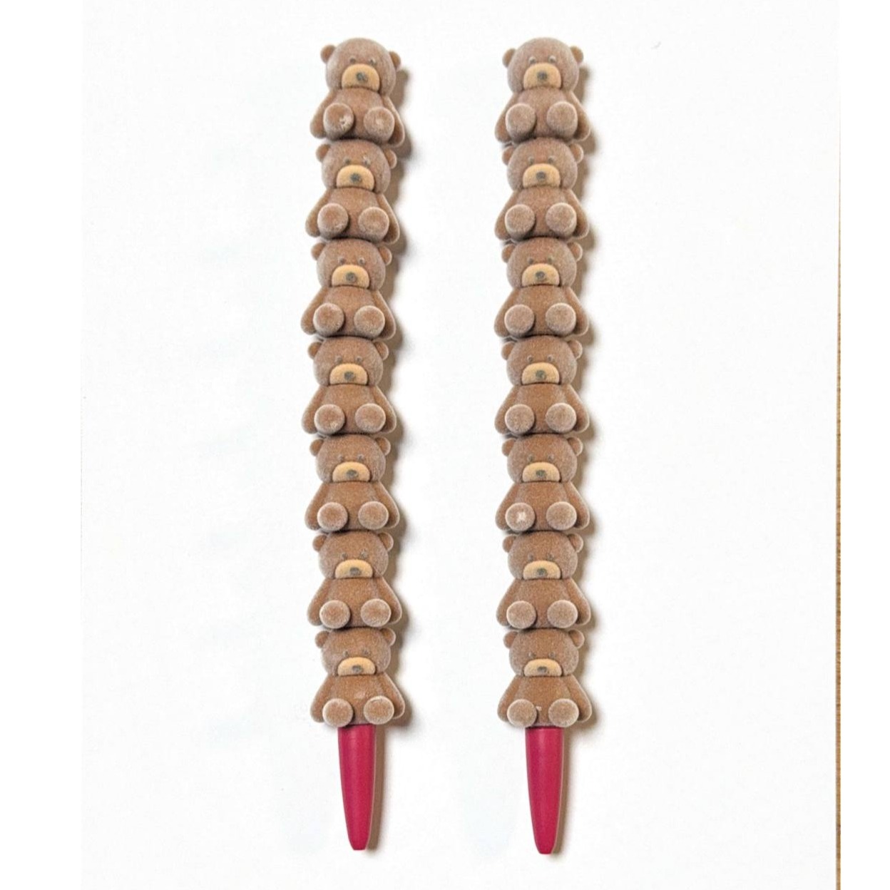 pen with a chain of bear charms