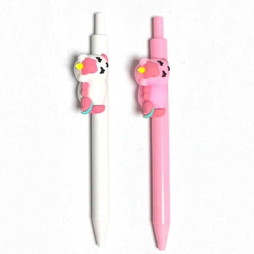 click pen with unicorn doll on side