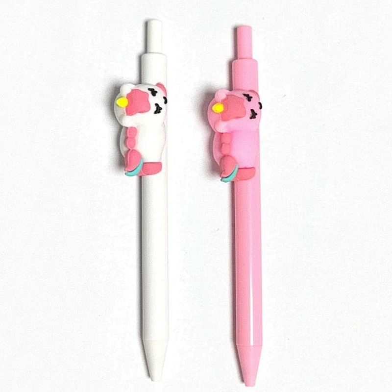 click pen with unicorn doll on side