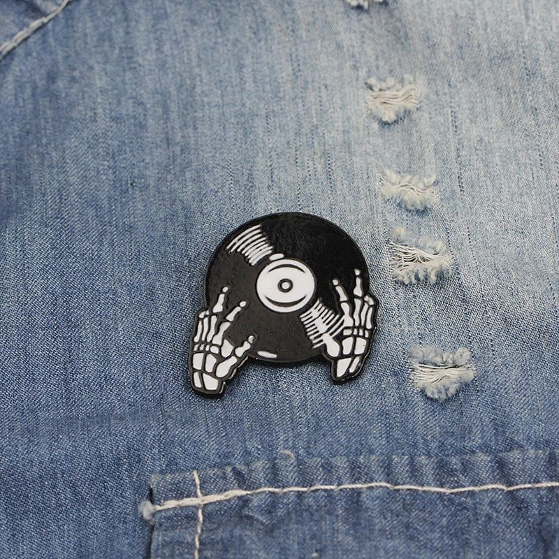 White Skeletal Hand with Black Disc Enamel Lapel Pin Custom