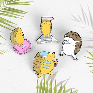 hedgehog reading book ready to ship soft enamel lapel pin