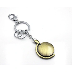 Wholesale custom logo globe shape metal key chain