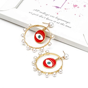 Jump ring hook eye of demon with pearls around earring earrings