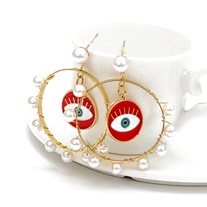 Jump ring hook eye of demon with pearls around earring earrings