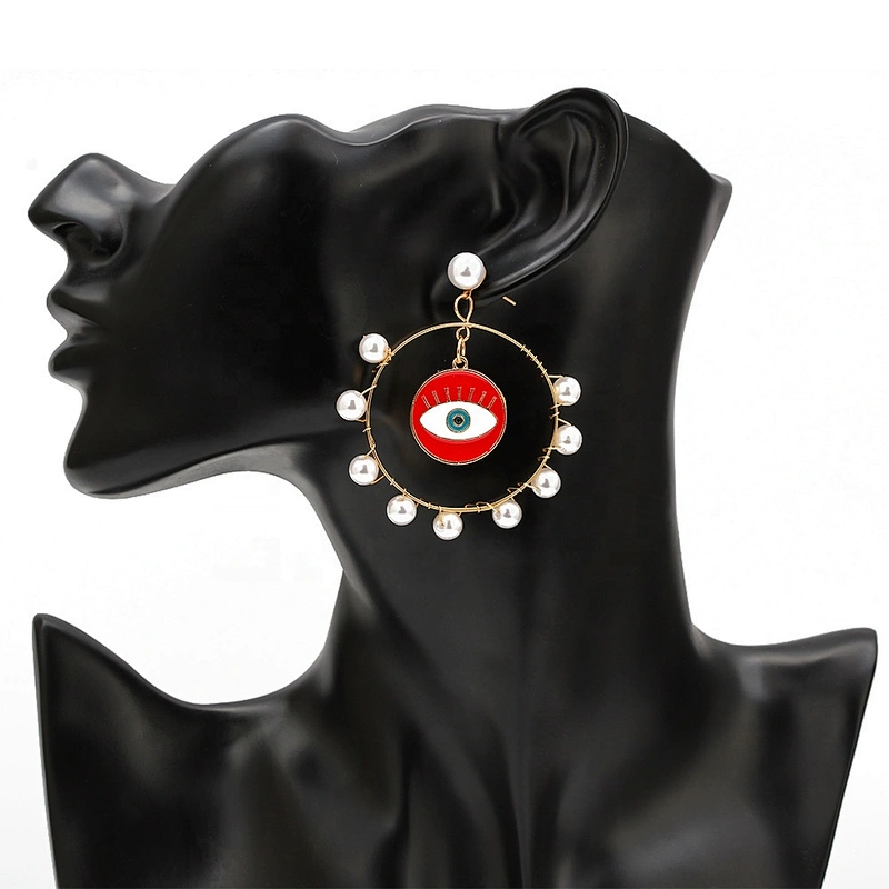 Jump ring hook eye of demon with pearls around earring earrings