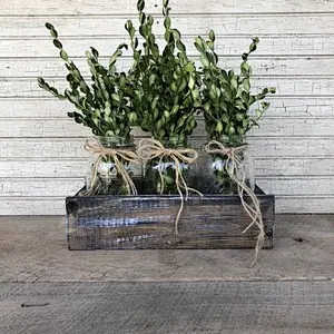 A crate planter in the style of a country farmhouse   wood box