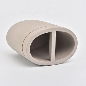 grey concrete bath room accessories with lotion bottles dispenser toothbrush holder