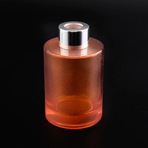 Transparent cylinder decal golden paper glass perfume bottles