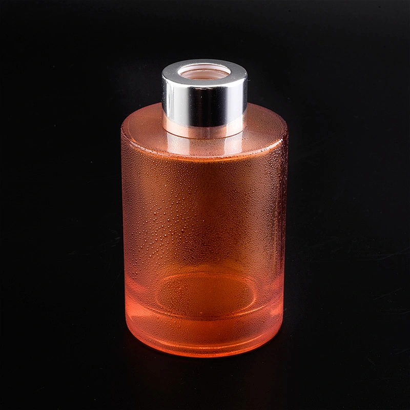 Transparent cylinder decal golden paper glass perfume bottles