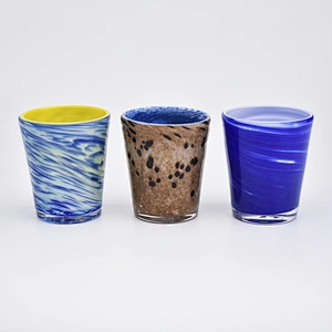 votive candle holders with coloful decorations