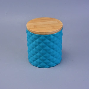 Matte iridescent ceramic candle holder with wood lid