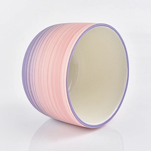 multiple color ceramic candle vessels with glazing decorations