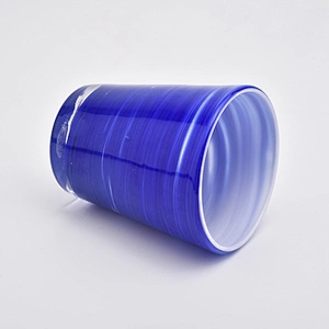 votive candle holders with coloful decorations