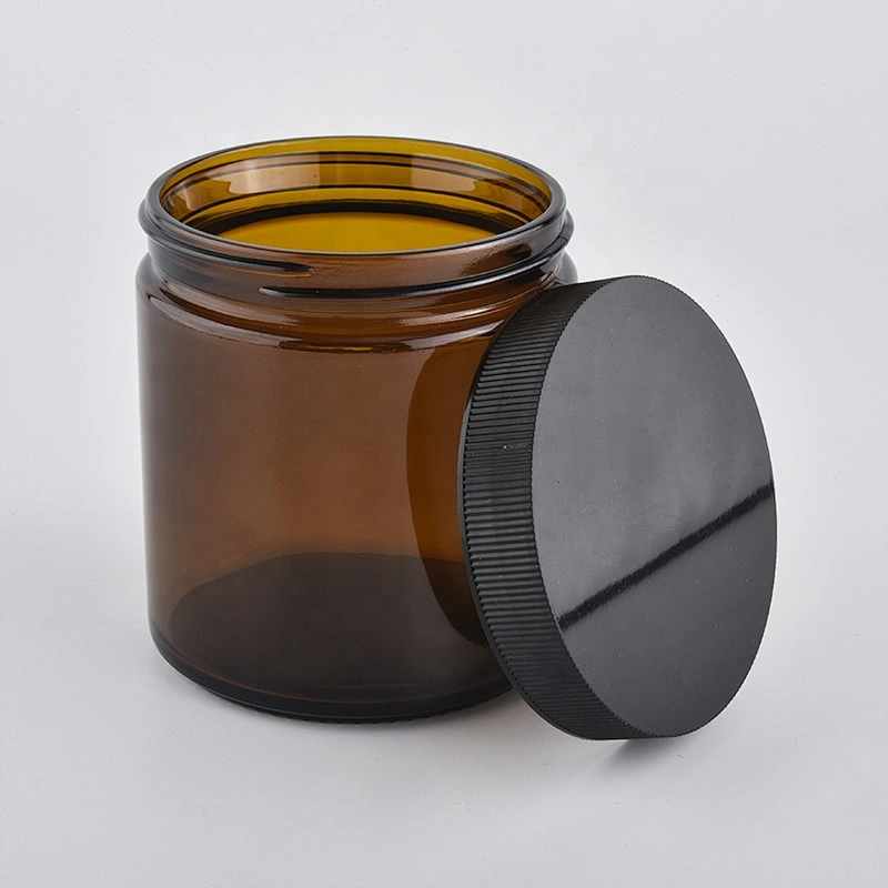 Supplier tealight amber glass candle holders with black plastic lid