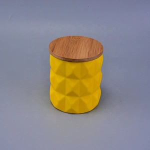 Handmade geo cut ceramic candle holder with wood lid