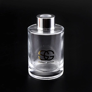 Transparent cylinder decal golden paper glass perfume bottles