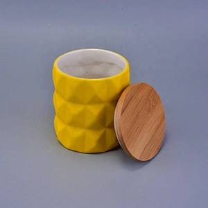 Handmade geo cut ceramic candle holder with wood lid