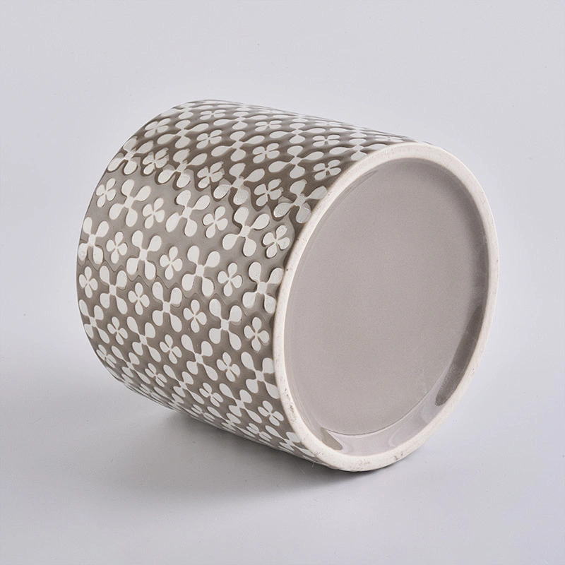 brown ceramic candle holder, round ceramic vessel with patterns