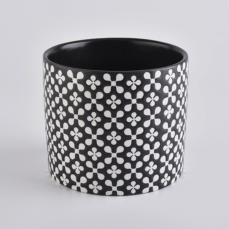 black round ceramic candle vessel with decorative pattern, cylinder ceramic candle holders