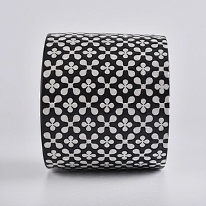 black round ceramic candle vessel with decorative pattern, cylinder ceramic candle holders