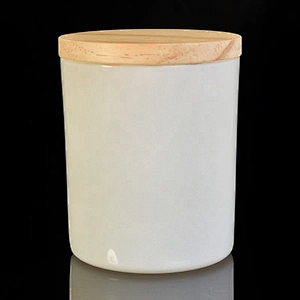 Stock white painting glass candle holder with wooden lid